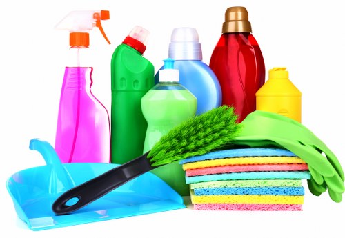 Carpet cleaning technician preparing safe equipment in SE1