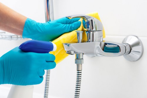 Cleaning technician treating a carpet stain carefully